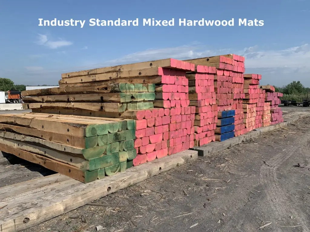 Typical mixed hardwood timber mats showing inconsistent species and dimensions in a storage yard