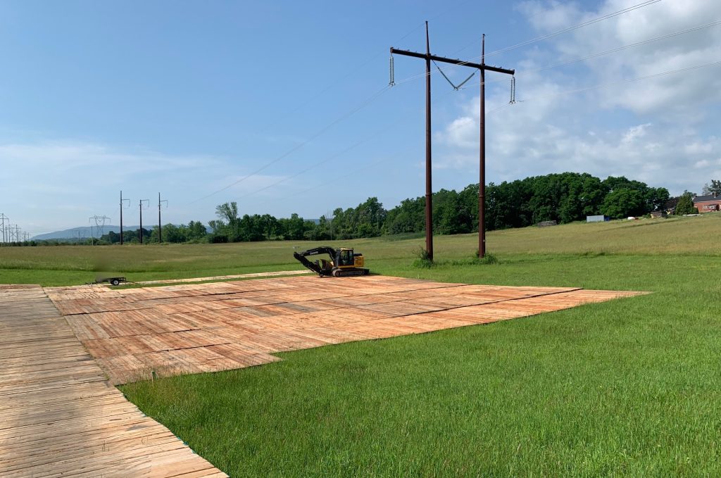 Eucalyptus timber mats in transmission line deployment - heavy-duty infrastructure support